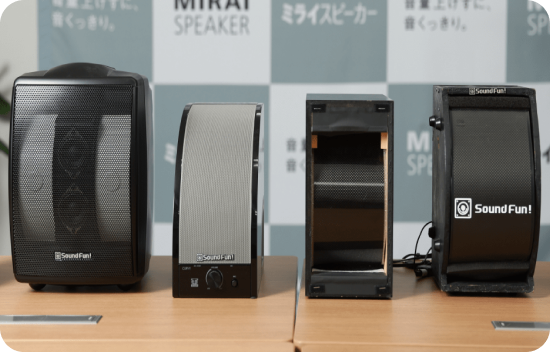 Multiple models of the Mirai Speaker on a desk